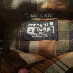 Two brand new Carhartt Flannels. Size XL.